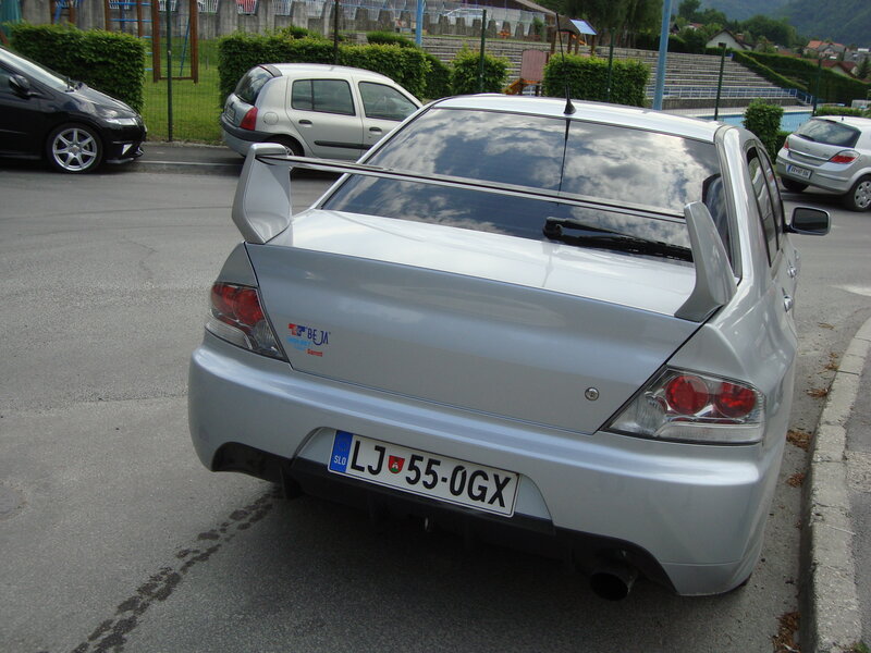 silver car with rear spoiler