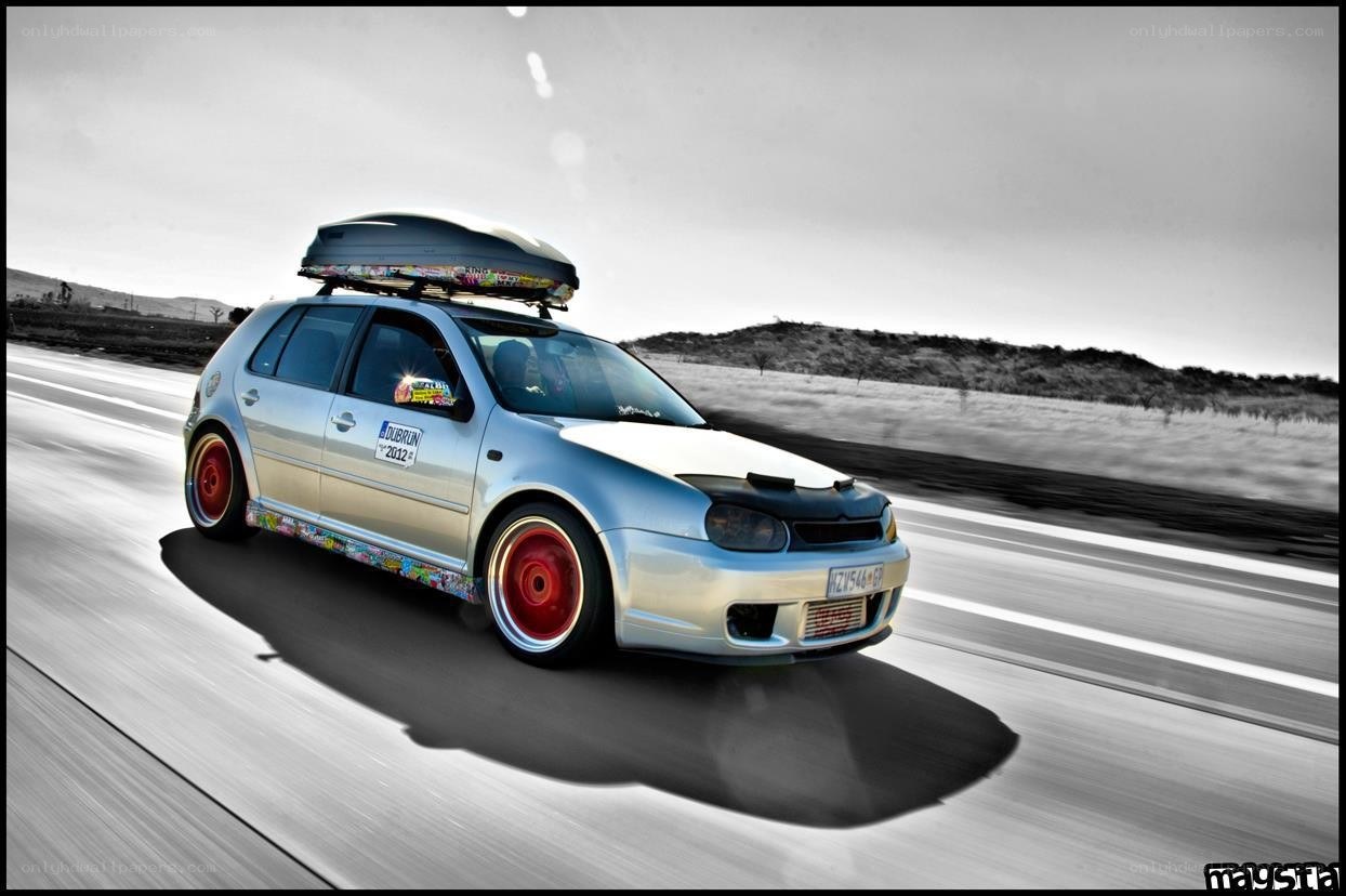 silver car with roof box