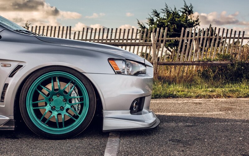 Silver Car with Teal Wheels — Calm