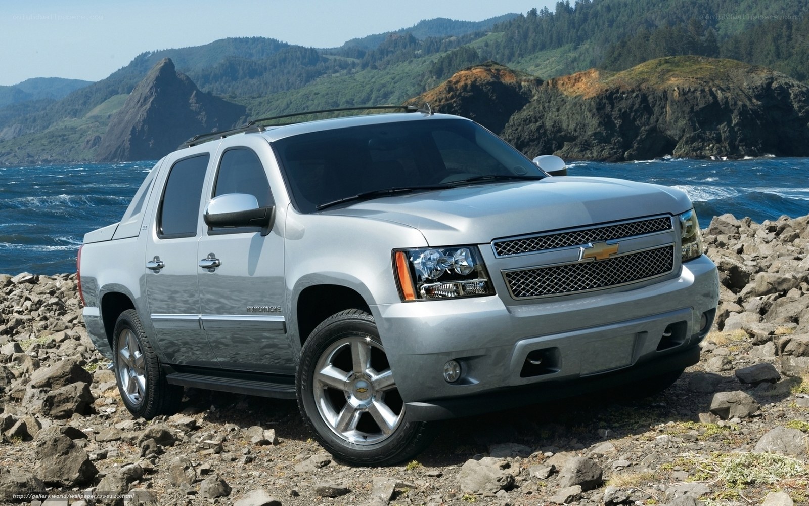 Silver Chevrolet Avalanche by the coast