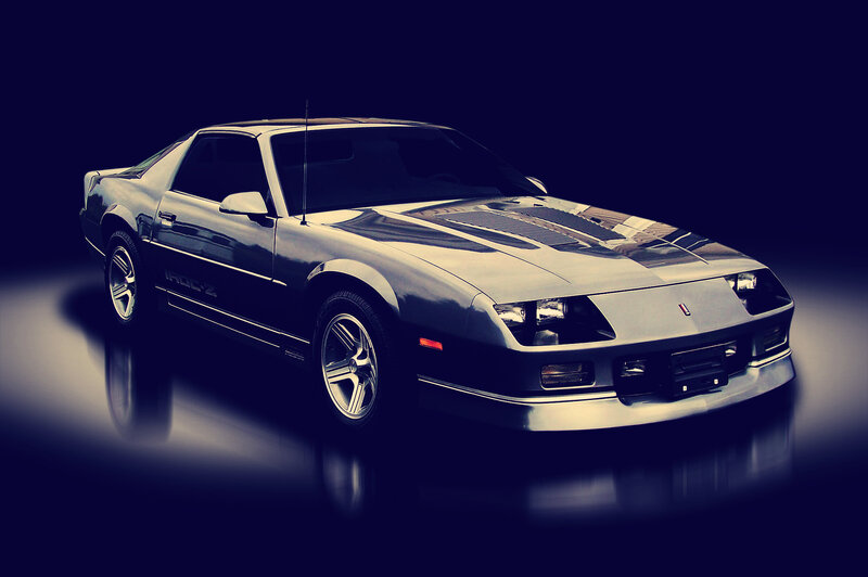 Silver Chevrolet Camaro — Black