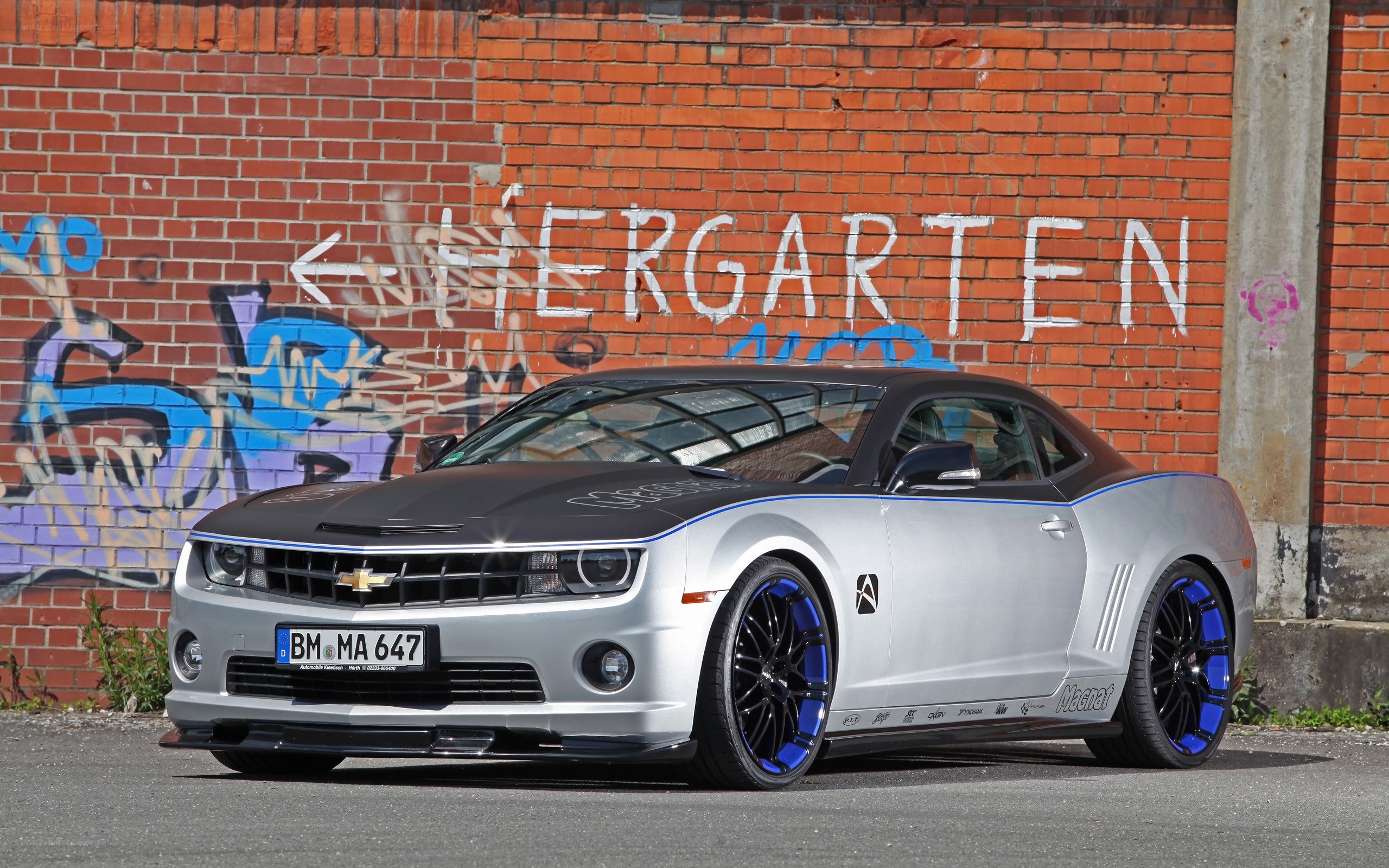 Silver Chevrolet Camaro with custom wheels