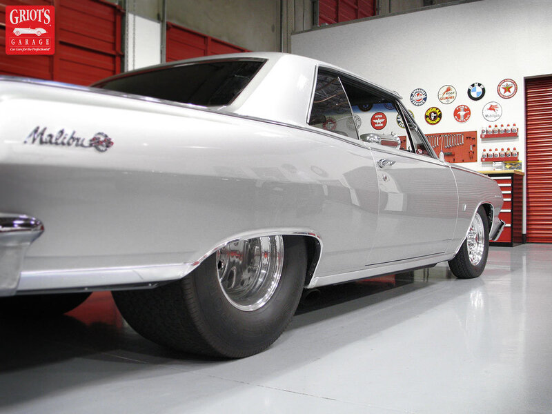 silver chevrolet malibu in garage