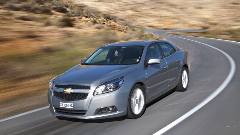 silver chevrolet malibu on road