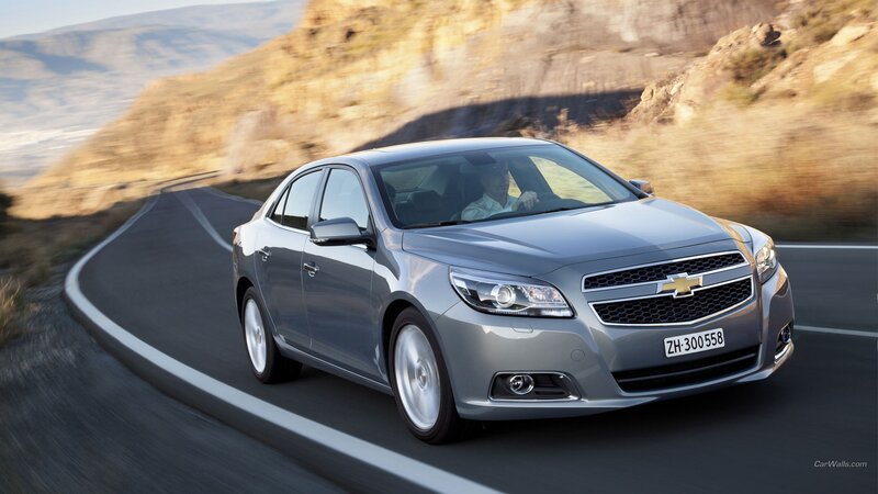 silver chevrolet malibu on winding road