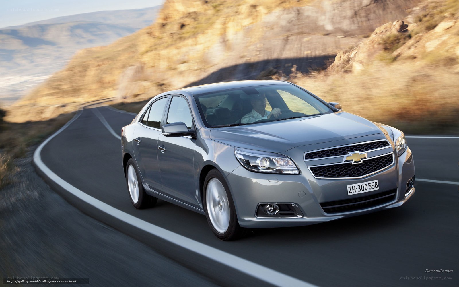 silver chevrolet malibu on winding road