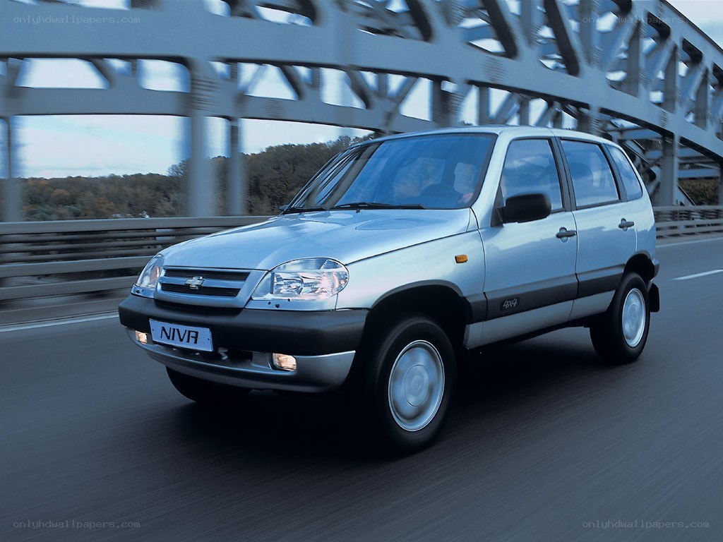Silver Chevrolet Niva on a bridge