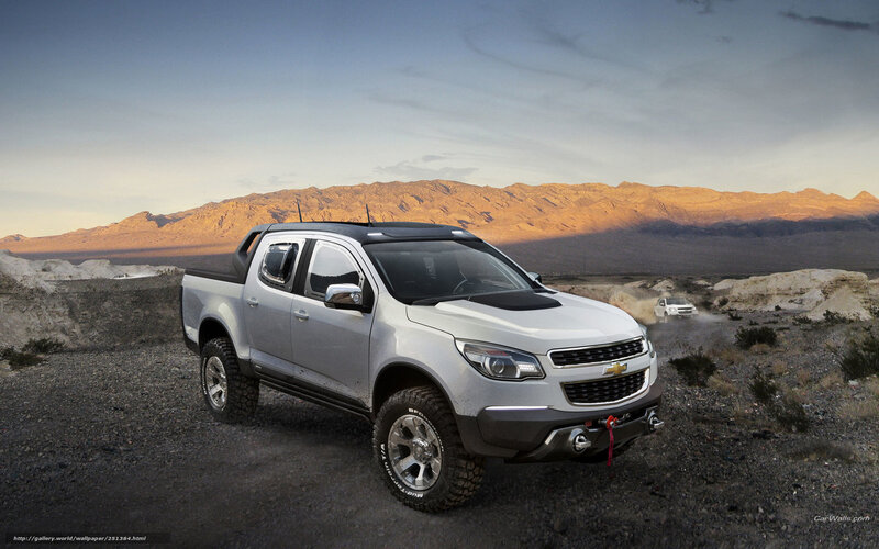 Silver Chevrolet pickup in desert