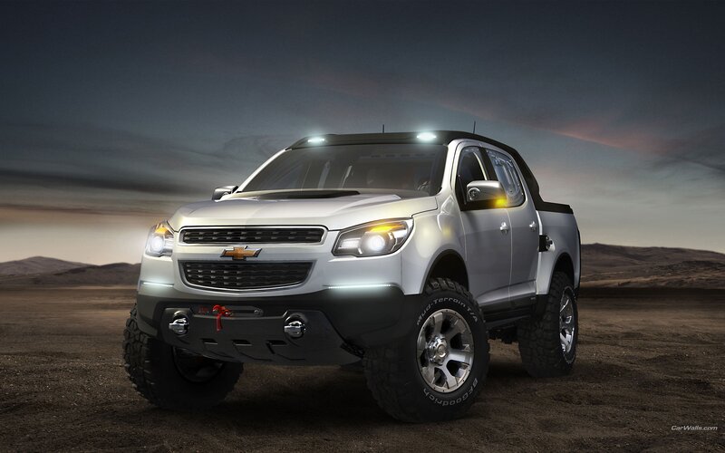Silver Chevrolet pickup truck in desert