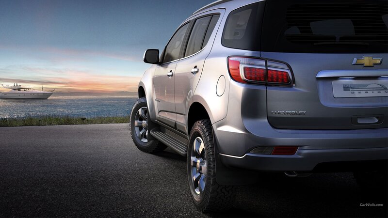 Silver Chevrolet SUV by the sea
