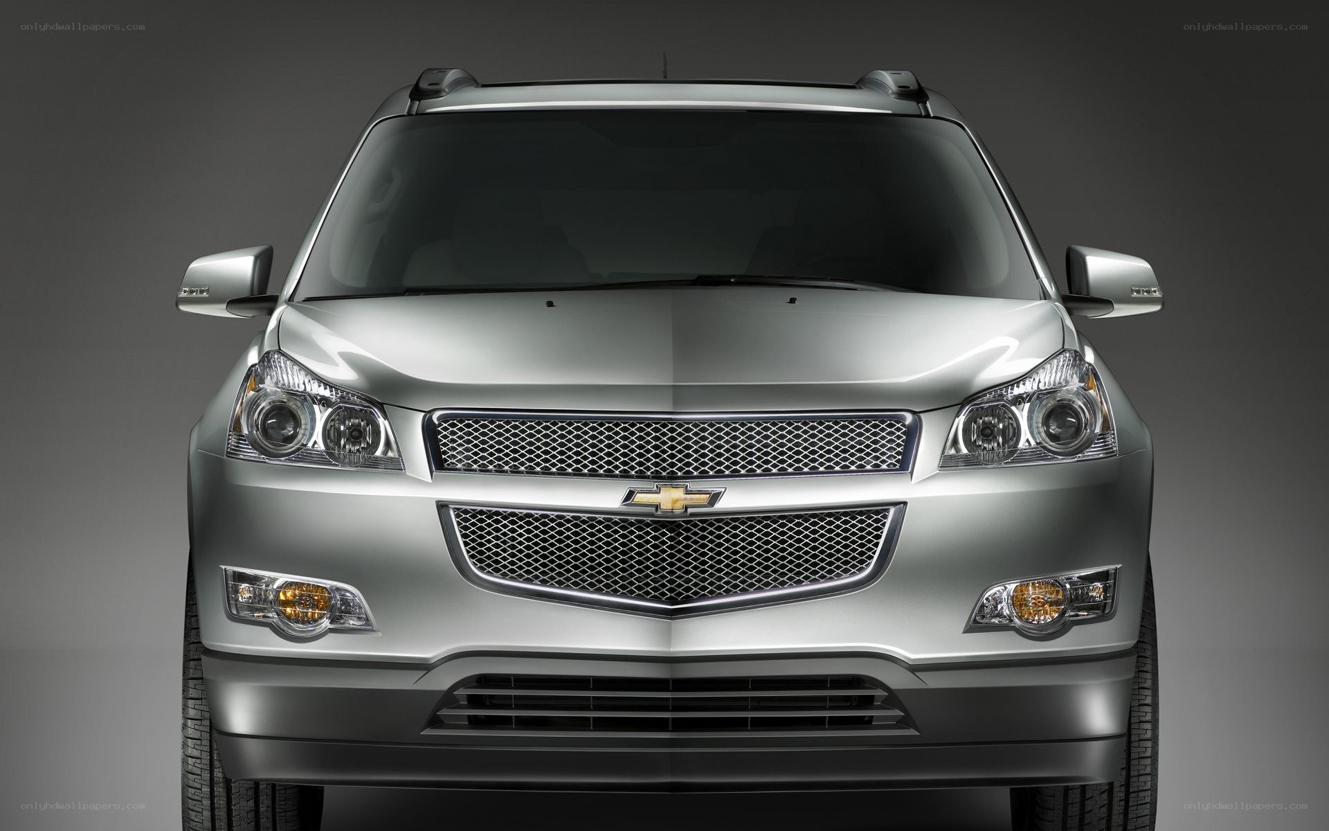 silver chevrolet suv front view