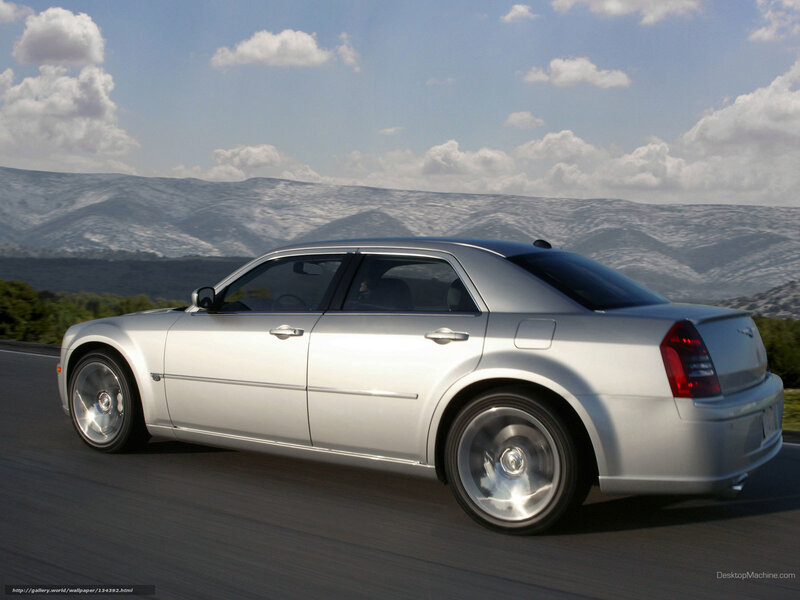 silver chrysler 300 in motion