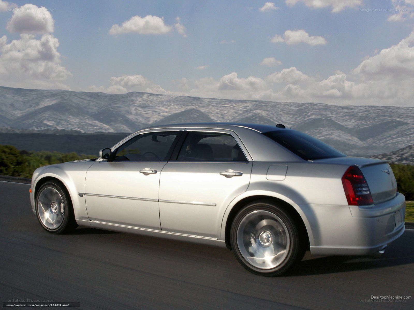silver chrysler 300 in motion