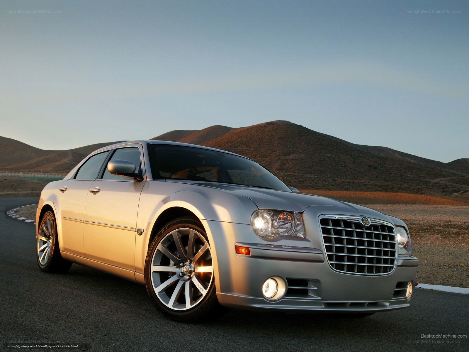 Silver Chrysler 300 on desert road