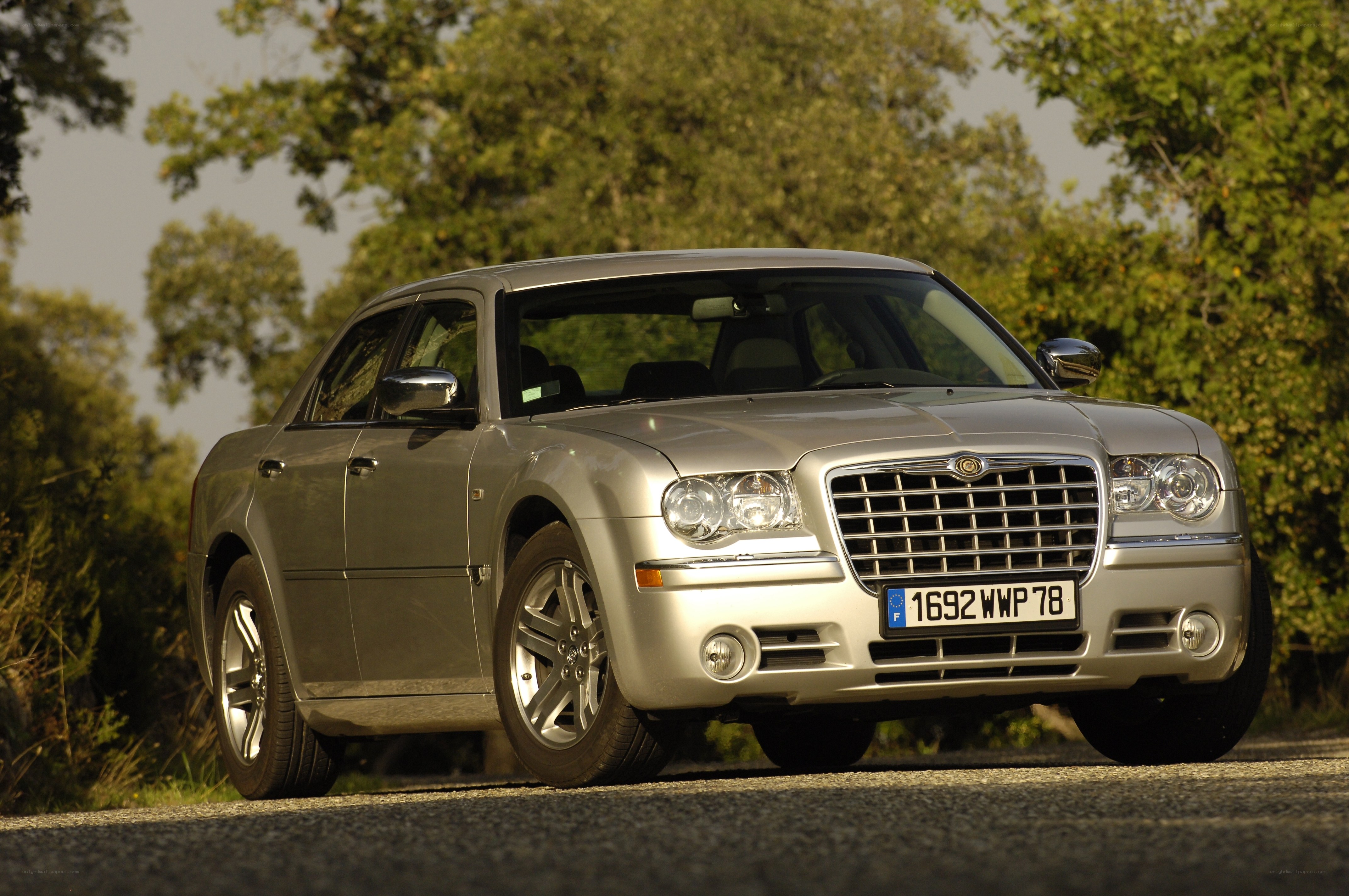 silver chrysler 300c on road