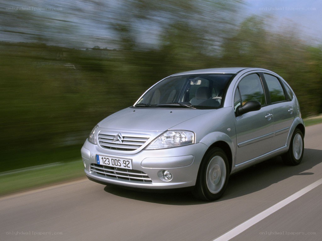 silver citroen c3 in motion