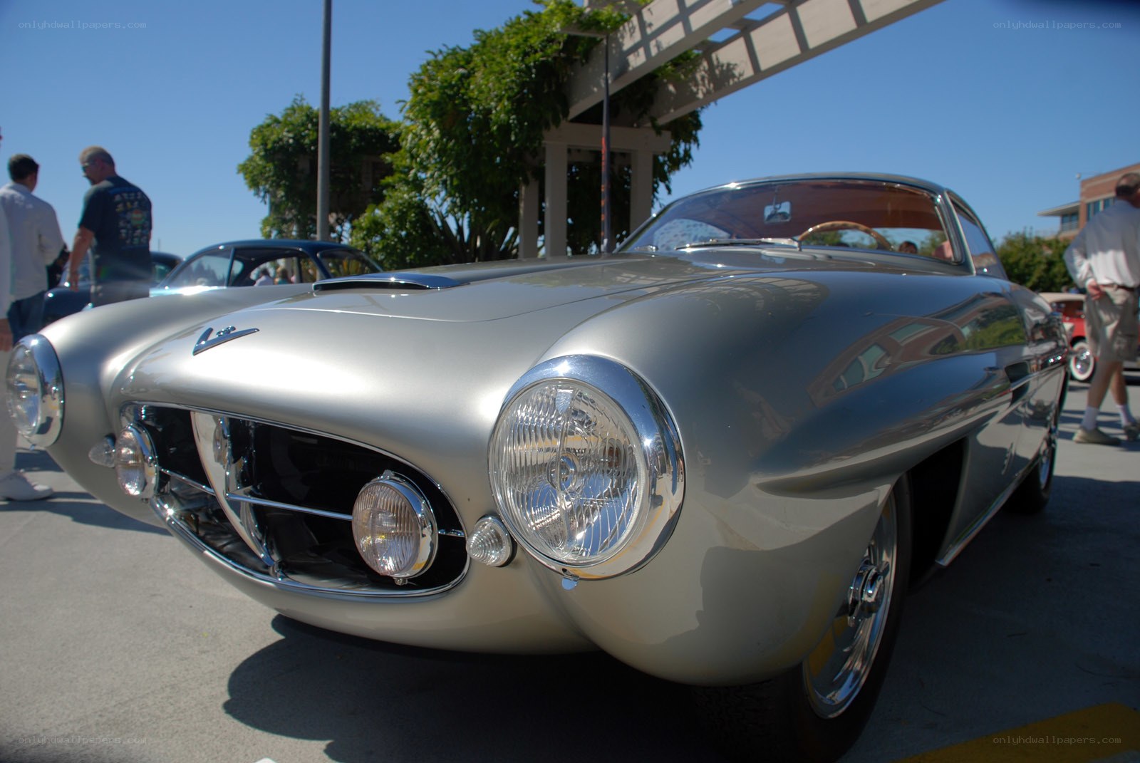 Silver classic car at outdoor show