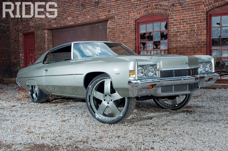 Silver Classic Car — Dramatic, Afternoon, Photograph, Brick Building