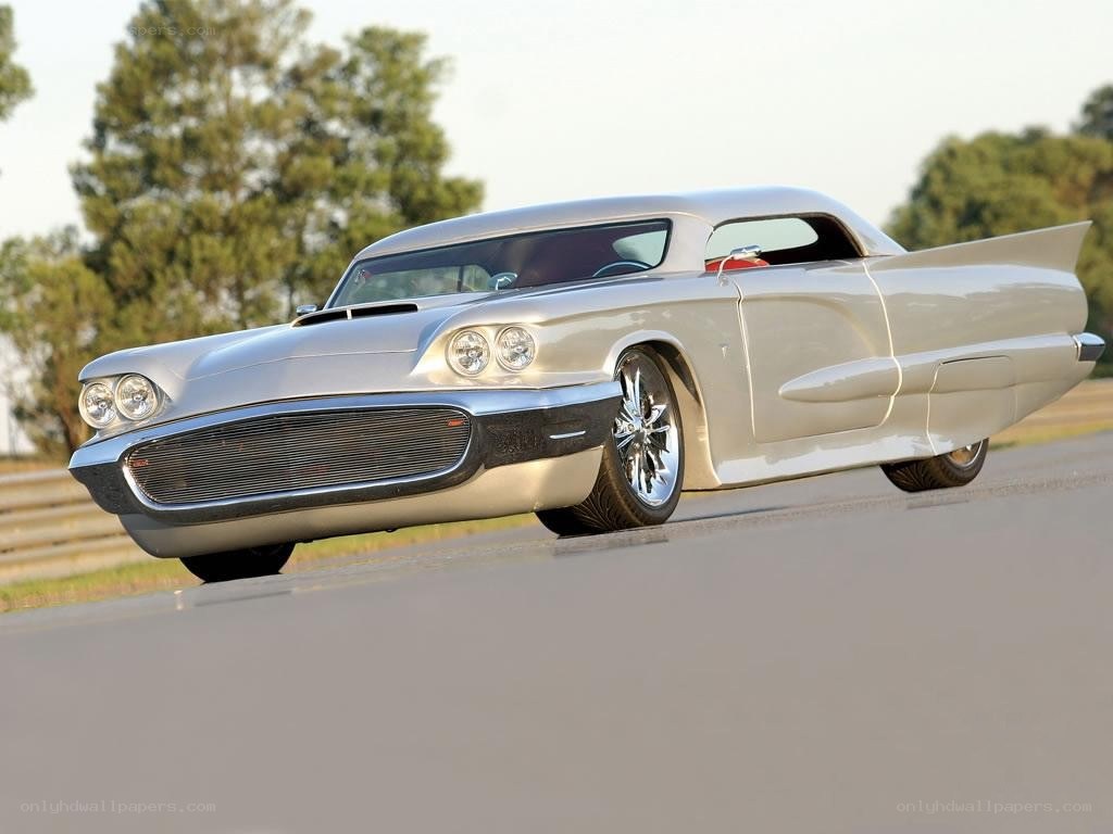 silver classic car on road