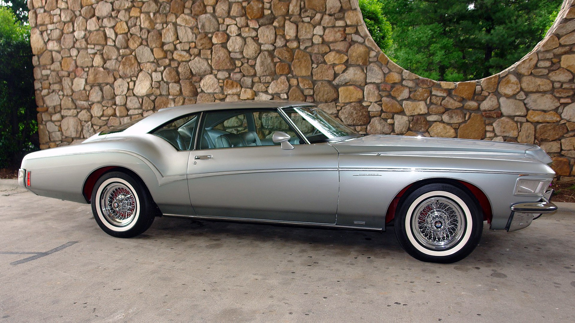 silver classic car parked