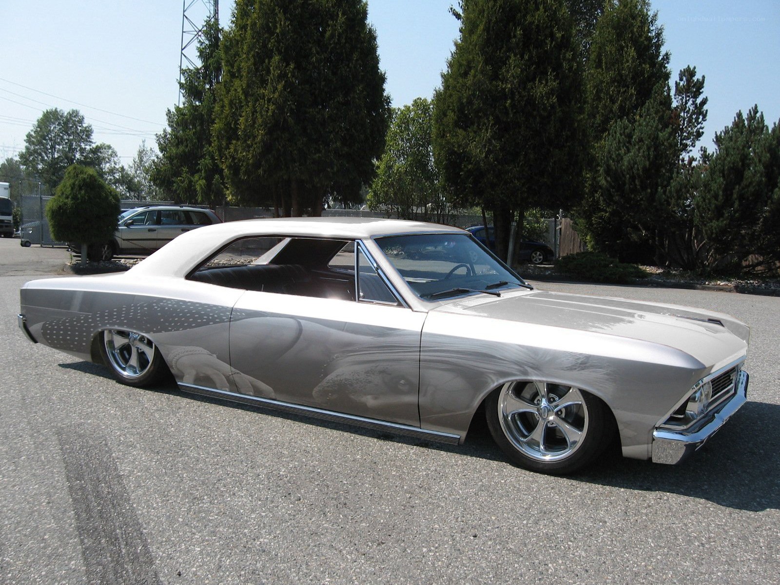 silver classic car with custom paint