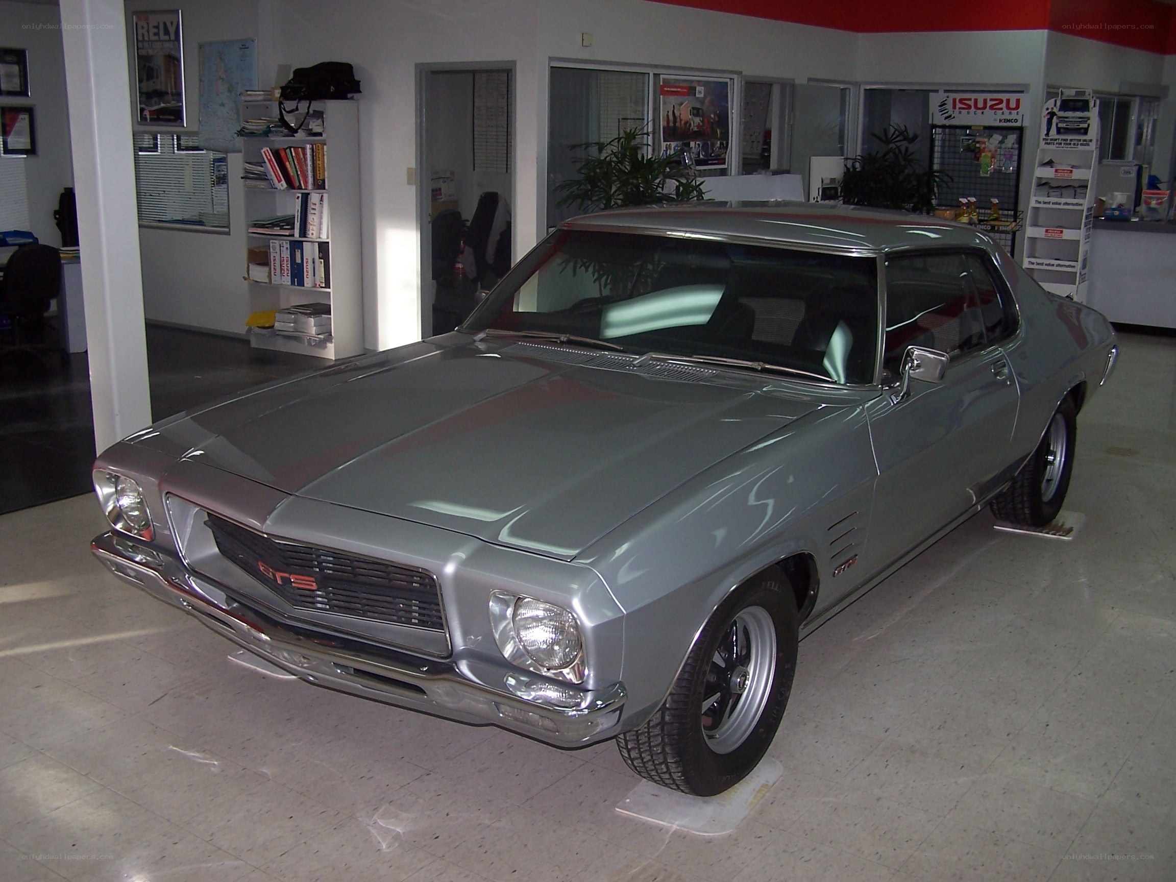 Silver classic muscle car on display