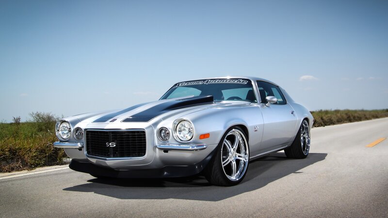 silver classic muscle car on road