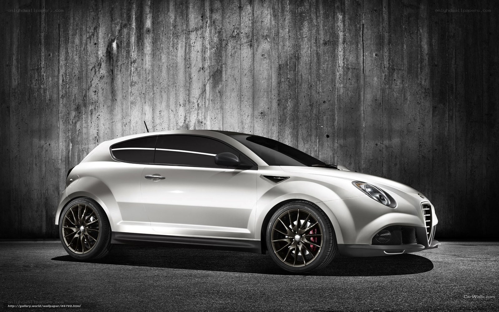 silver compact car in studio