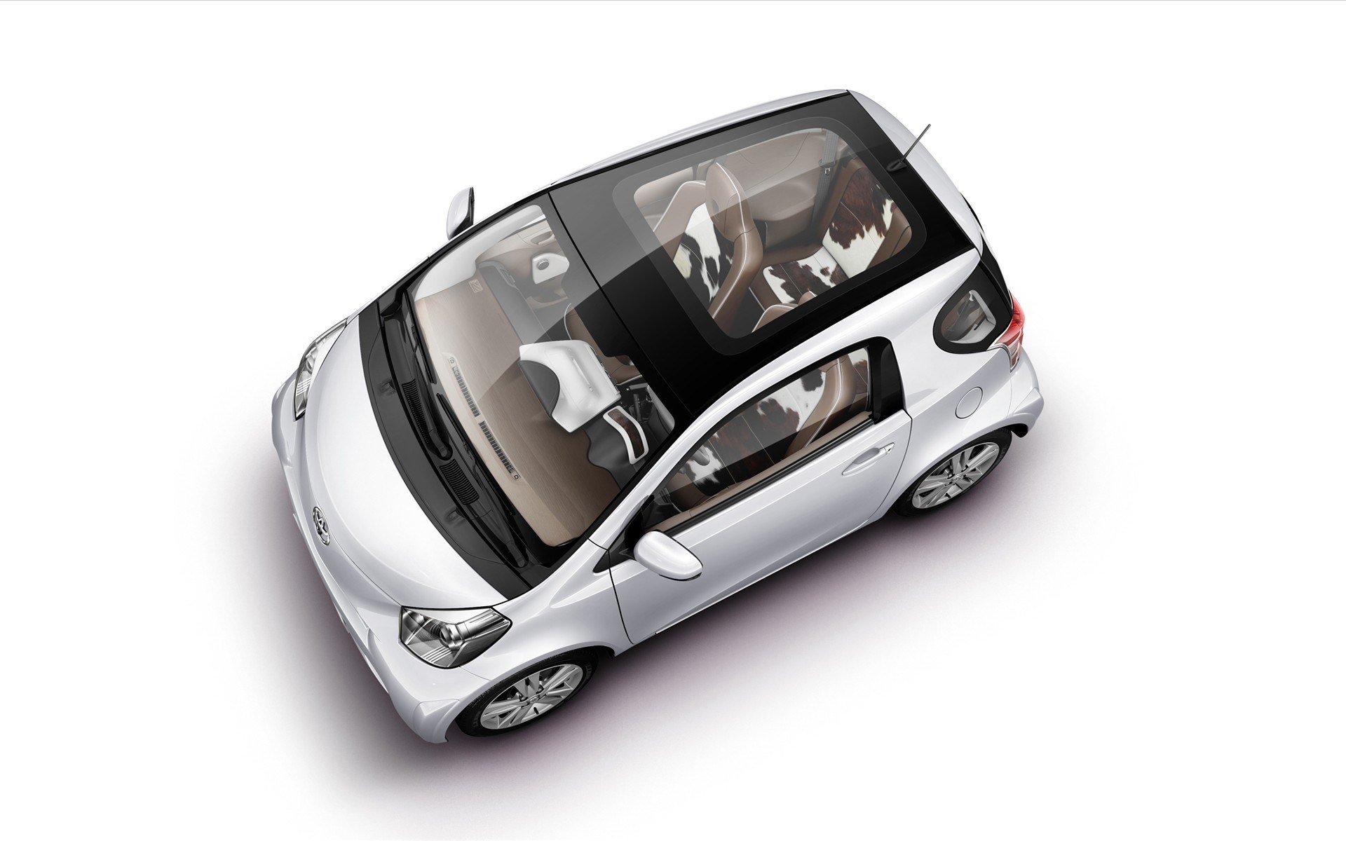 silver compact car with cowhide seats