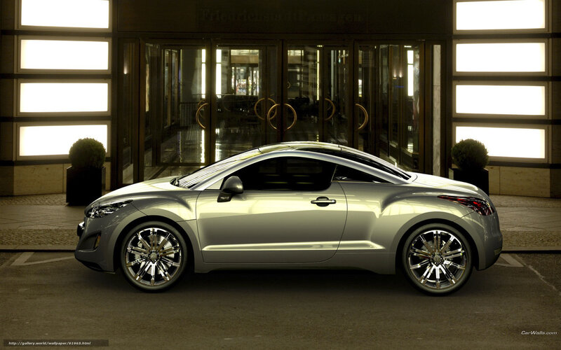 Silver concept car at hotel entrance