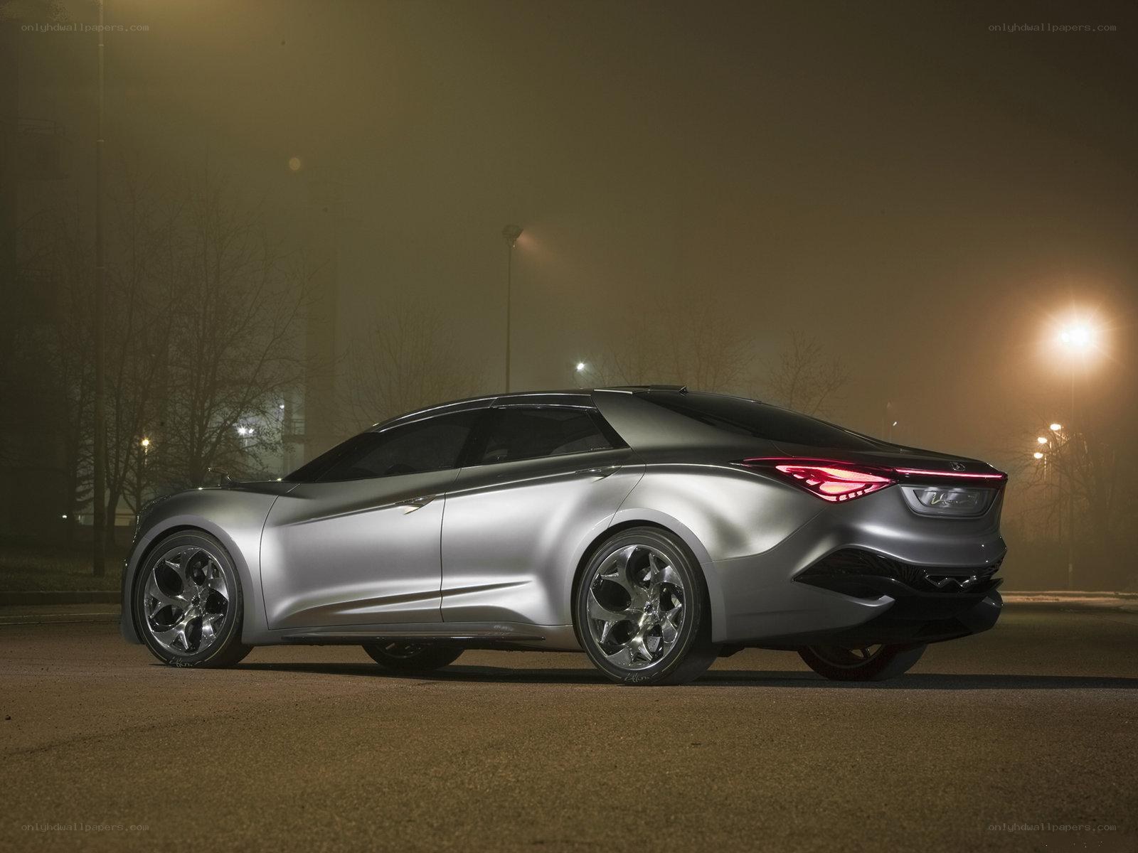 Silver concept car at night