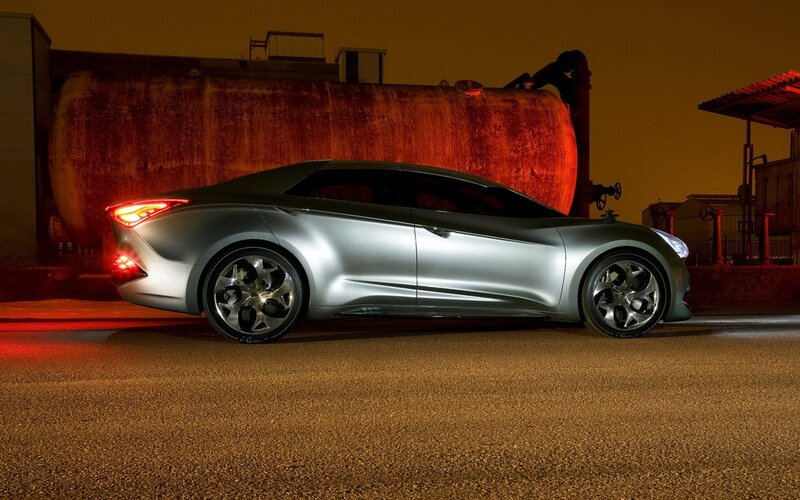 Silver concept car at night