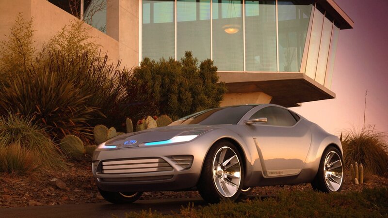 Silver concept car at sunset