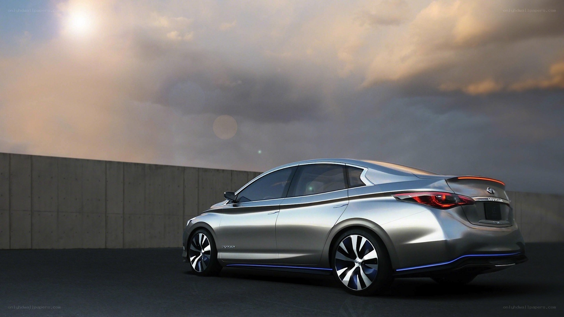 silver concept car at sunset