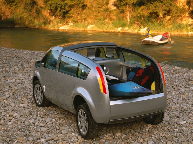 Silver concept car by river