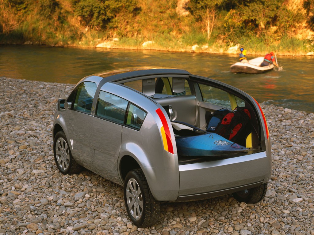 Silver concept car by river
