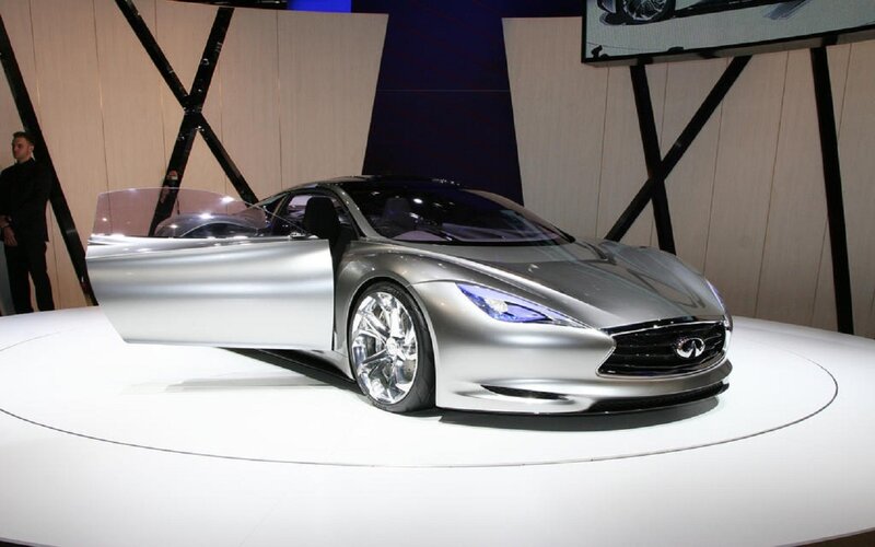 Silver Concept Car — Dramatic, Photograph, Car Show, Display Stand