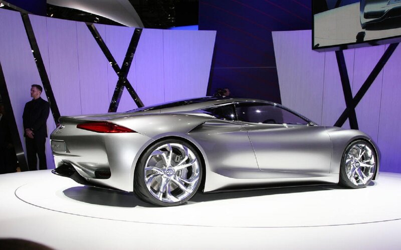 Silver Concept Car — Dramatic, Photograph, Man in Suit, Display Screen