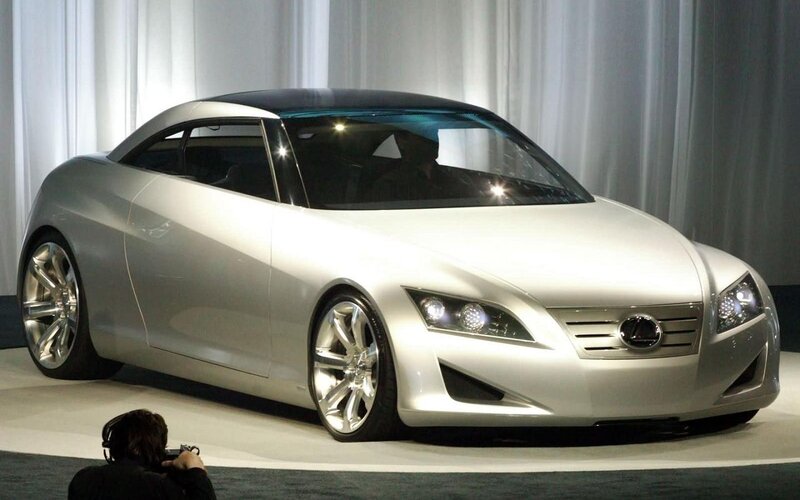 Silver Concept Car — Dramatic, Photograph, Person