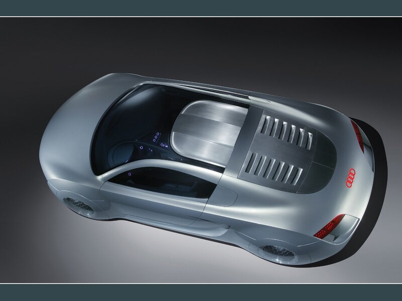 Silver Concept Car — Dramatic, Photograph, Red Logo
