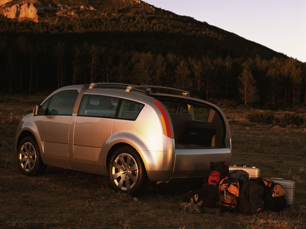 Silver concept car in a field