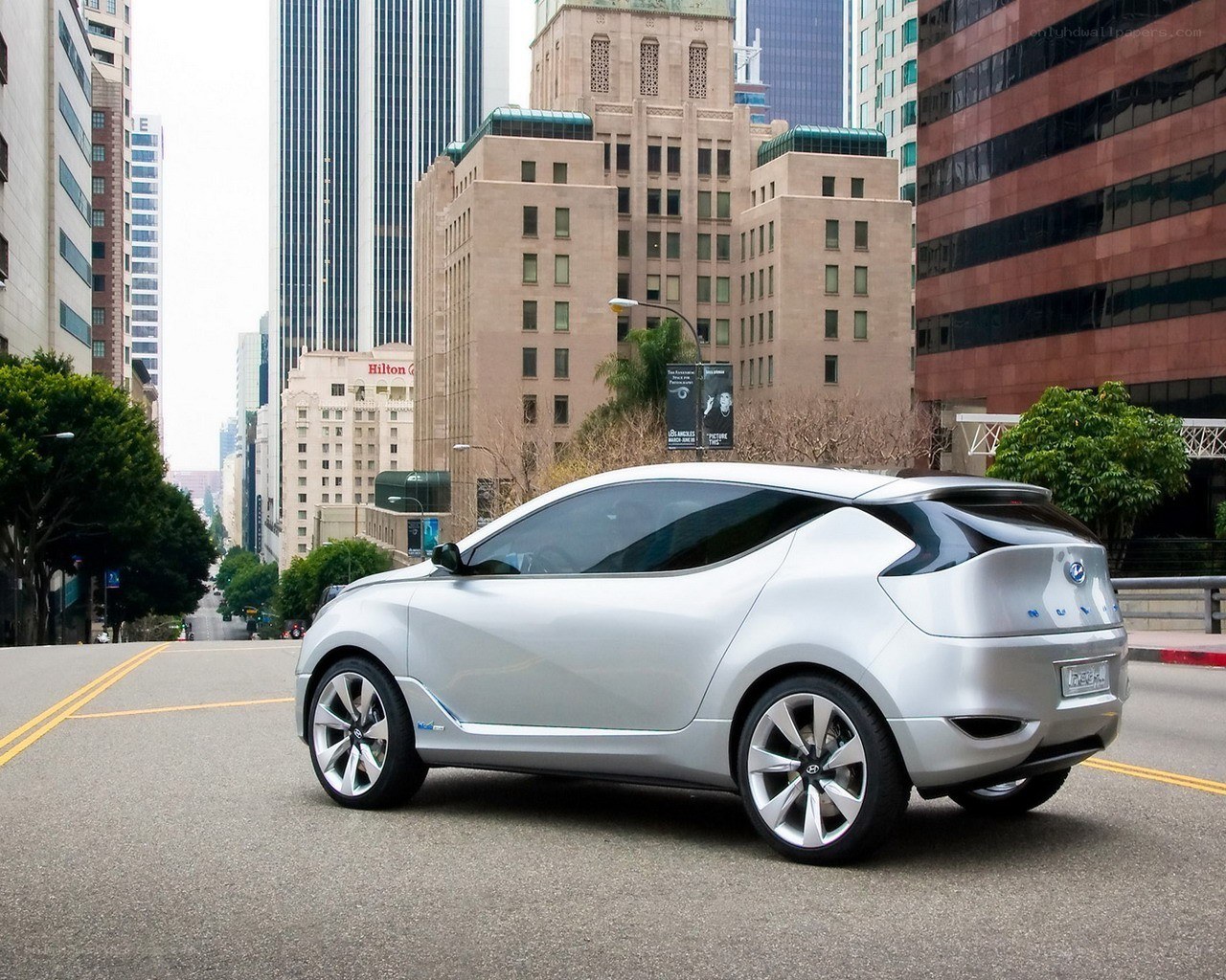Silver concept car in city
