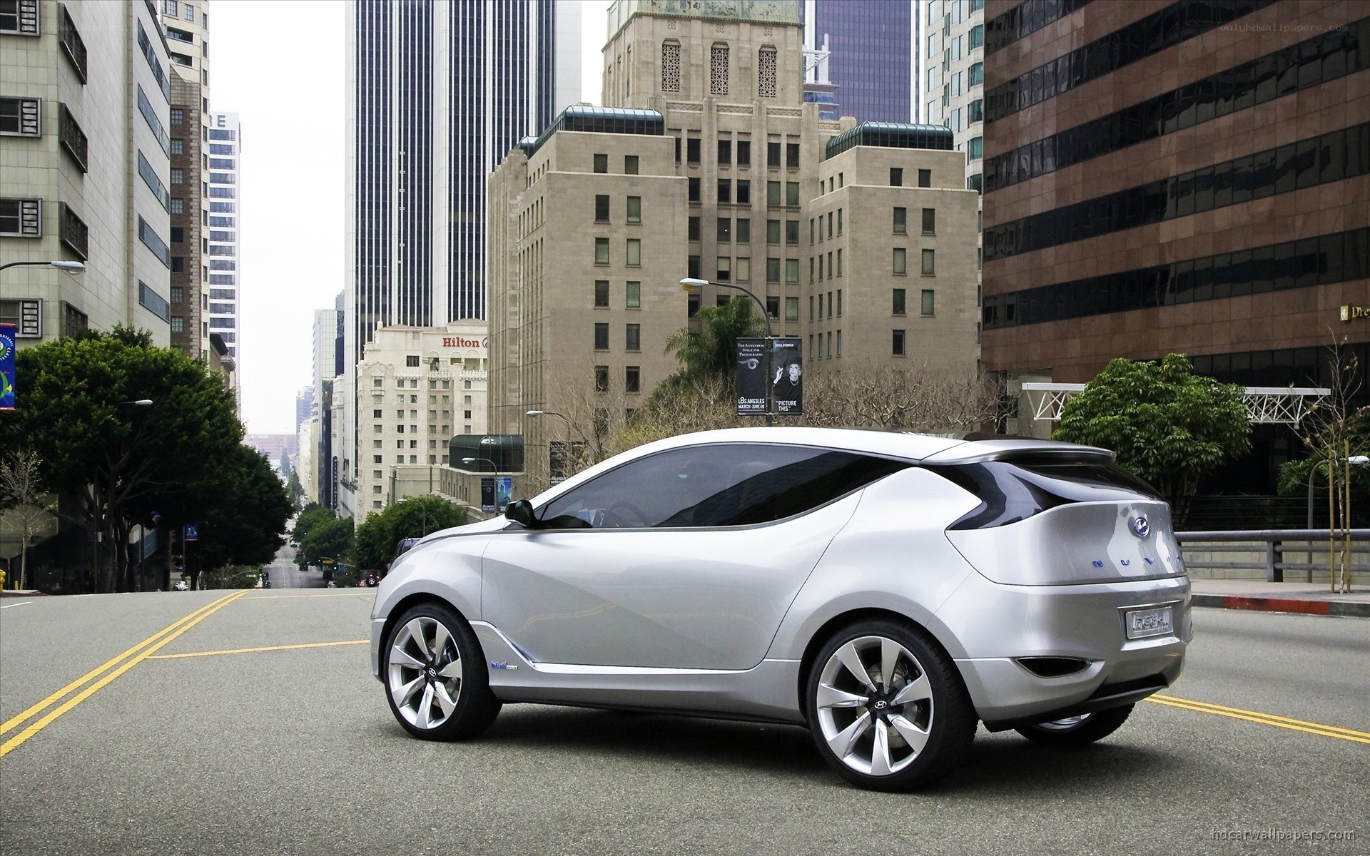 Silver concept car in city