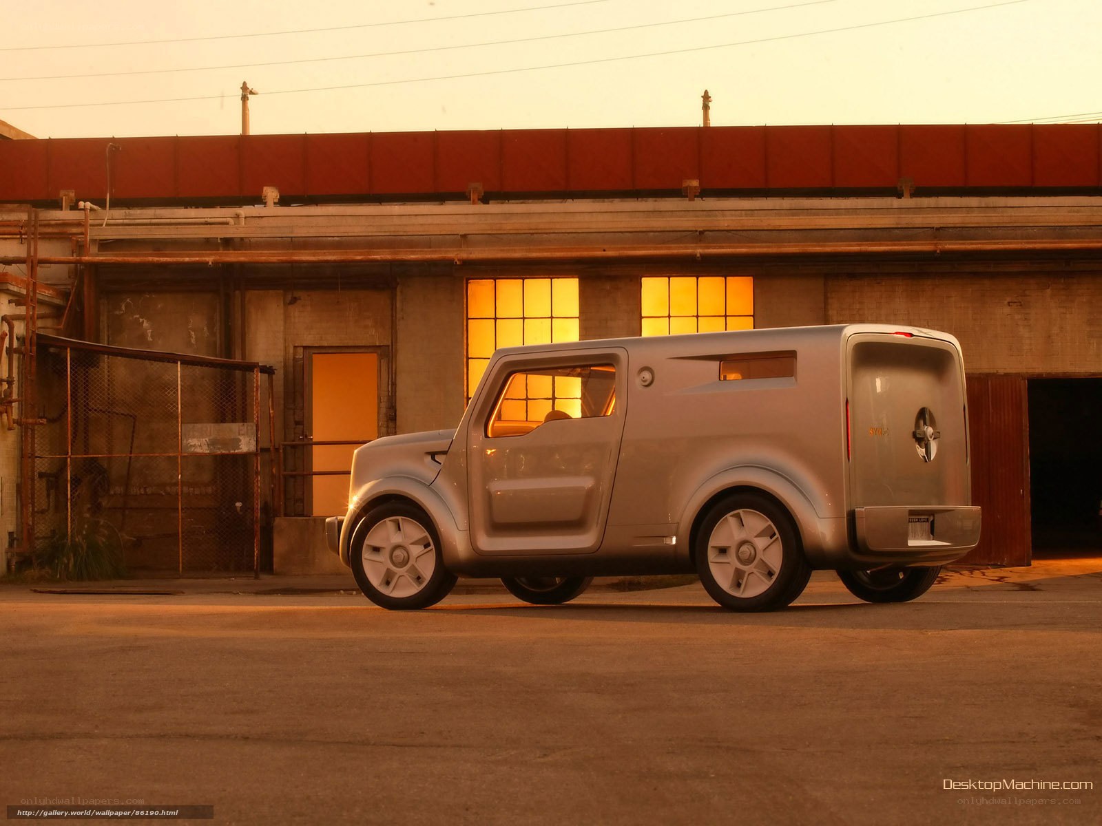 Silver concept car in industrial setting