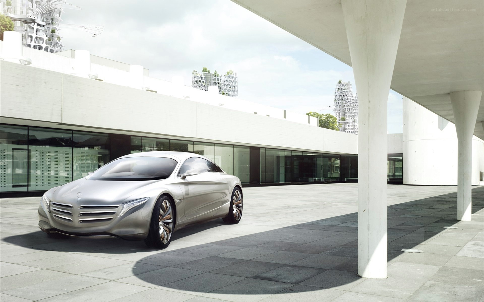 Silver concept car in modern setting