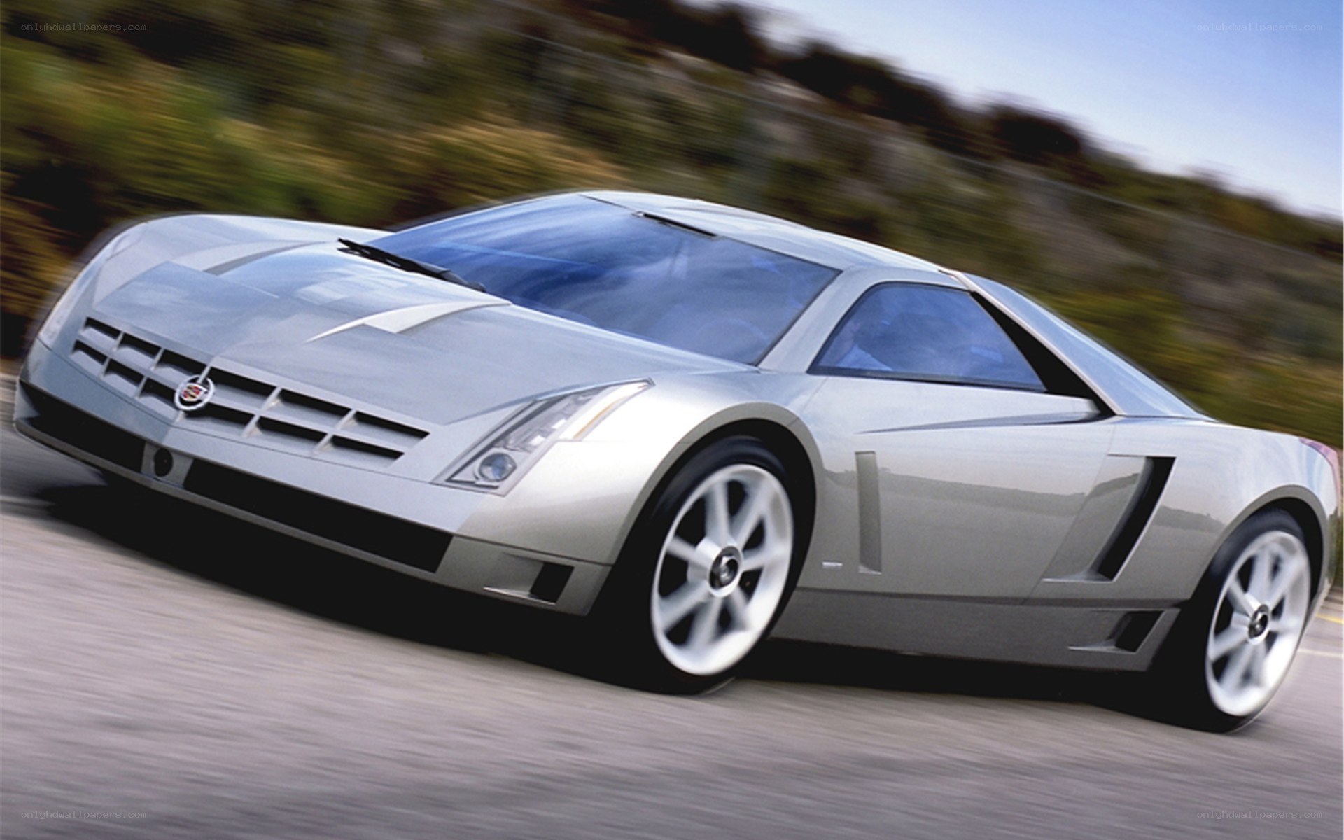 silver concept car in motion