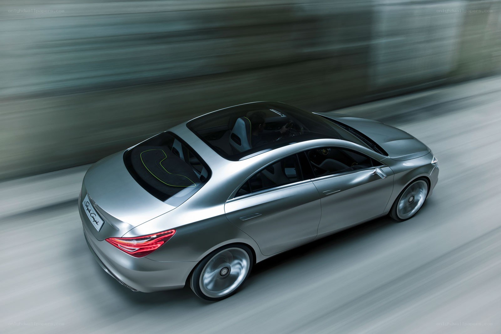 silver concept car in motion