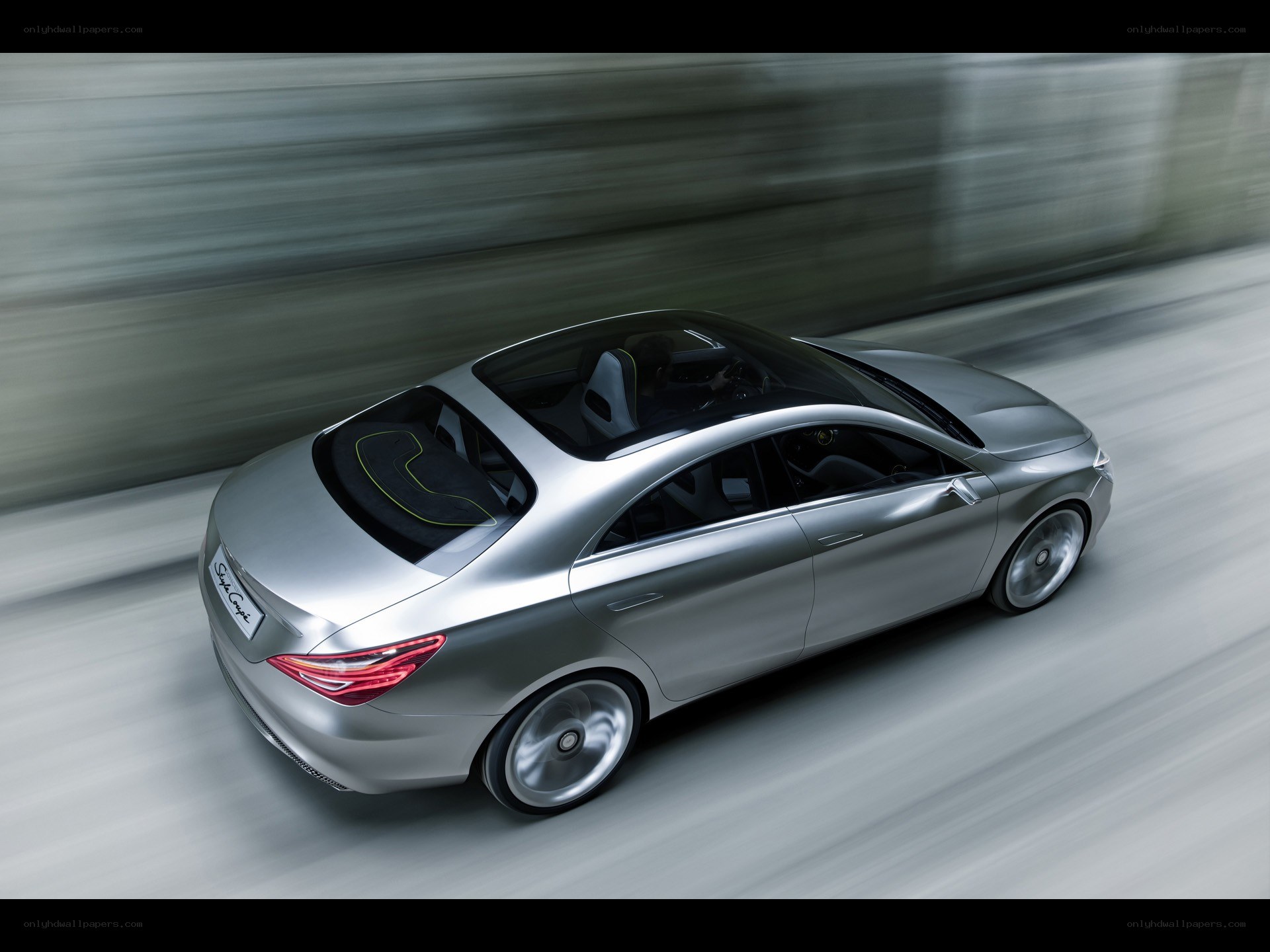Silver concept car in motion