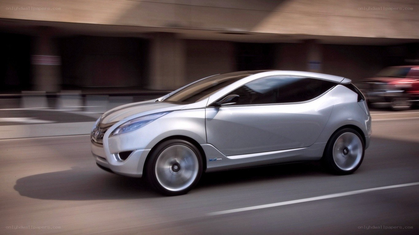 silver concept car in motion