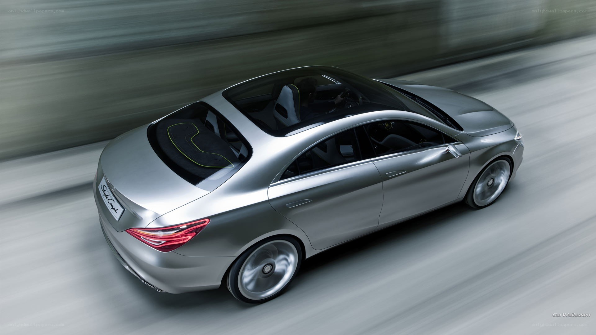 Silver concept car in motion